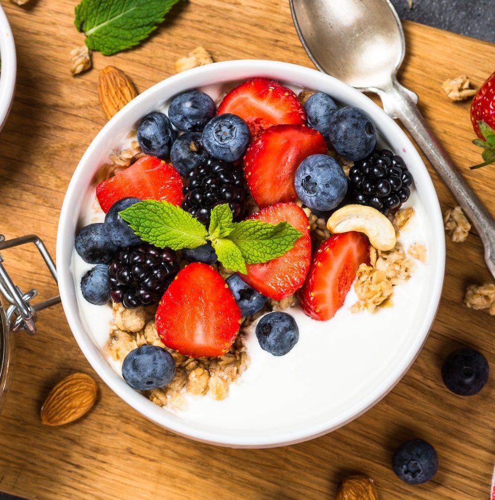 greek-yogurt-granola-with-fresh-berries-e1664470850475.jpg